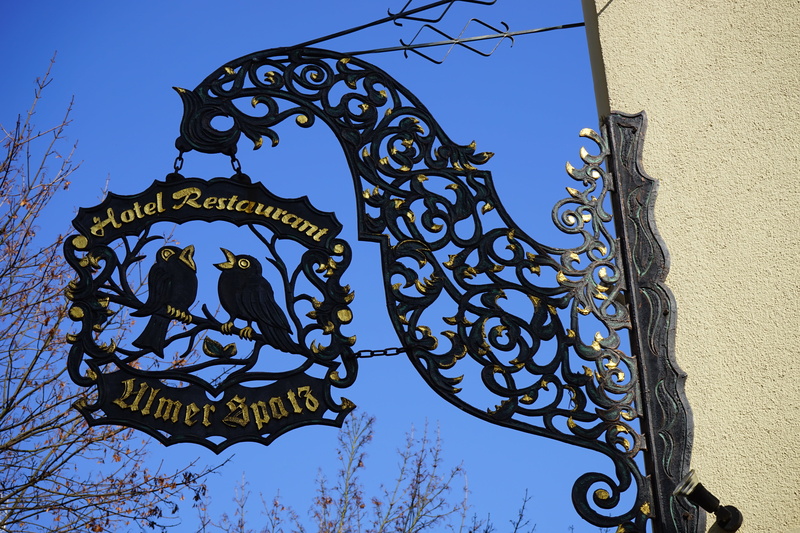 travel destinations, gilded, ornaments, blue, ornate, built structure, guest house shield, advertising sign, black, ulm sparrows, art and craft, building exterior