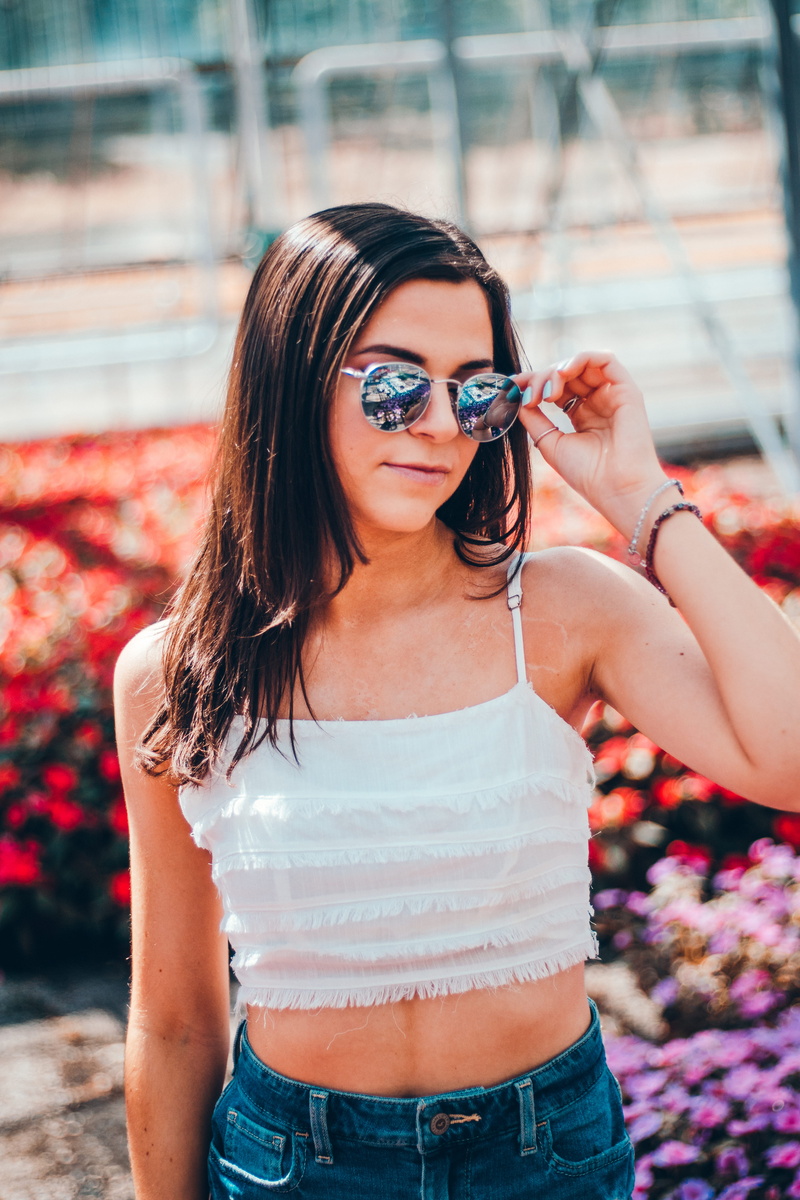 holding, young adult, day, sunglasses, selective, young women, outdoors, hairstyle, aviator, glasses, focus on foreground, adult, focus, beautiful woman