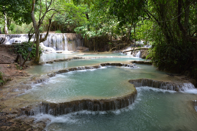 outdoors, rainforest, power in nature, water, motion, river, green color, forest, plant, kouang sy, land, waterfall, beauty in nature, tree, day, flowing water