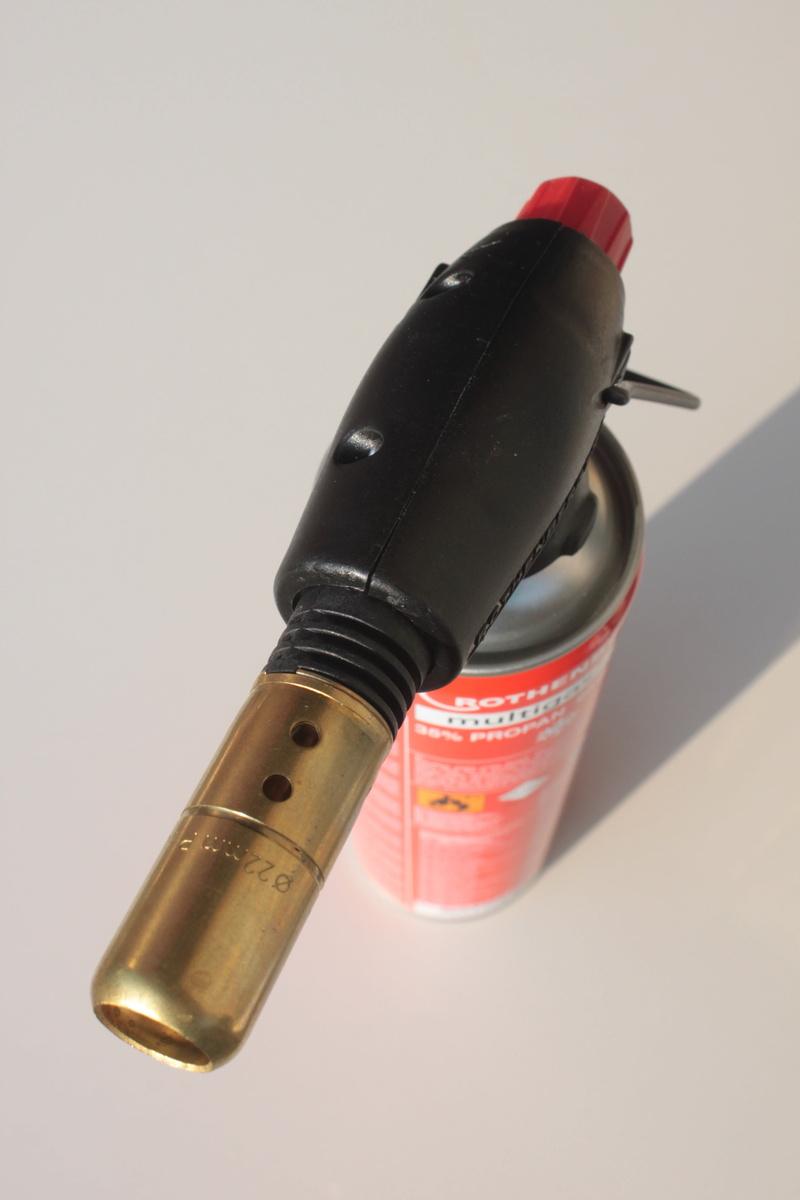 still life, studio shot, communication, pipe, equipment, shadow, indoors, single object, writing instrument, close-up, focus on foreground, no people, 4K