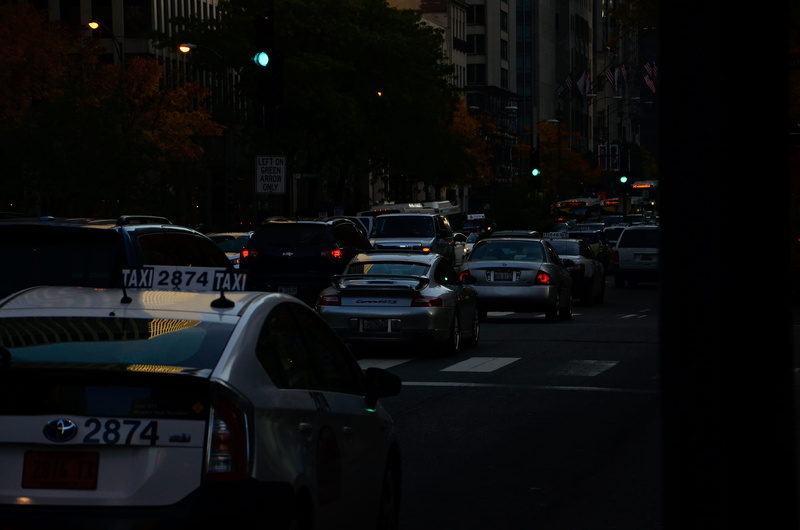 city, motor vehicle, city street, city life, porsche, road, cars, traffic, car, taxi, land vehicle, chicago, building exterior, built structure, united states