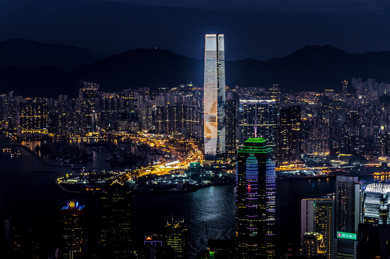 urban, city, buildings, dark, office building exterior, crowded, mountains, building exterior, waterfront, water, financial district, skyline, evening