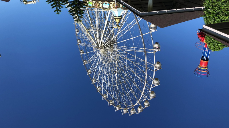 outdoors, philippines, ferris wheel, blue sky, low angle view, tree, built structure, directly below, wheel, no people, architecture, shape, arts culture and entertainment