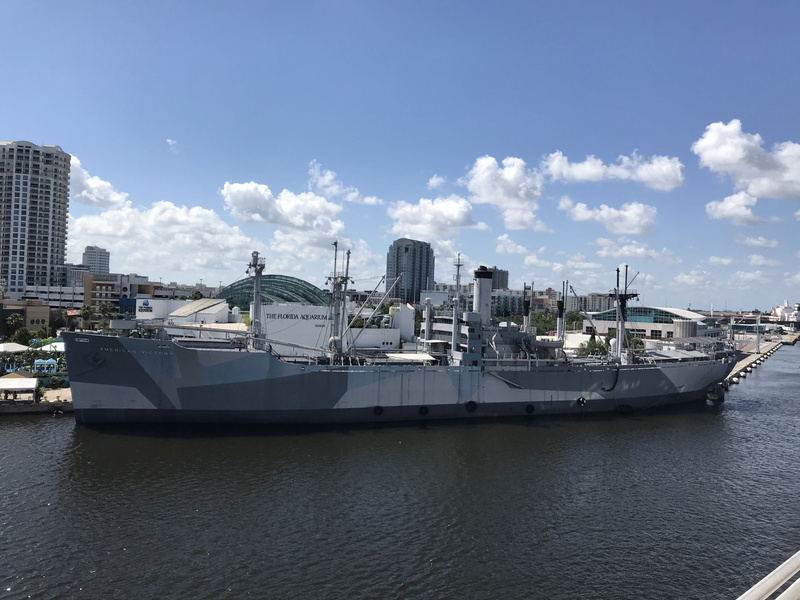 city, ss american victory ship, building exterior, moored, cloud - sky, luxury, skyscraper, naval ship, ss american victory, built structure, water, transportation