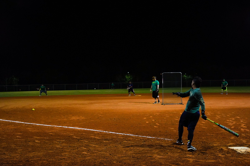 full length, men, competitive sport, softball, playing, leisure activity, group of people, playing field, football, tampa, baseball - sport, building, tennis