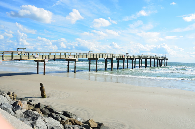 sand, tranquil scene, tropical, outdoors, seascape, tourism, day, pier, fishing, sky, blue, summer, sea, st augustine beach, surf, vacation, colorful, architecture