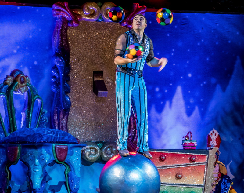 performance, front view, young adult, arts culture and entertainment, costume, exhibit, event, display, stage, women, table, show, person, decoration, juggler