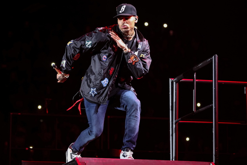front view, males, one person, red, low angle view, stage, nightlife, illuminated, real people, stage - performance space, standing, chris brown high resolution  widescreen
