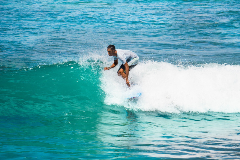 ocean, lifestyles, waikīkī, surfing, maverick, men, water, man, board, wave, outdoors, sea, weekend activities, motion, sport, day, waterfront, turquoise colored