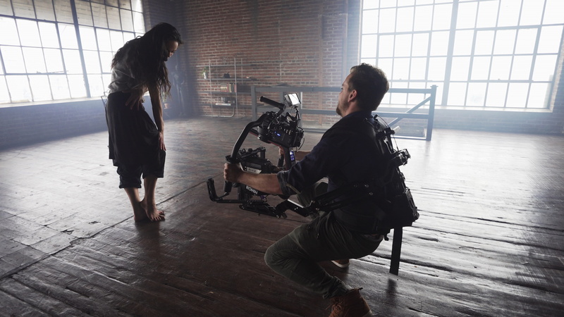 gear, women, taking, government, men, architecture, person, crouching, filming, hairstyle, videographer, window, togetherness, video, standing, lifestyles