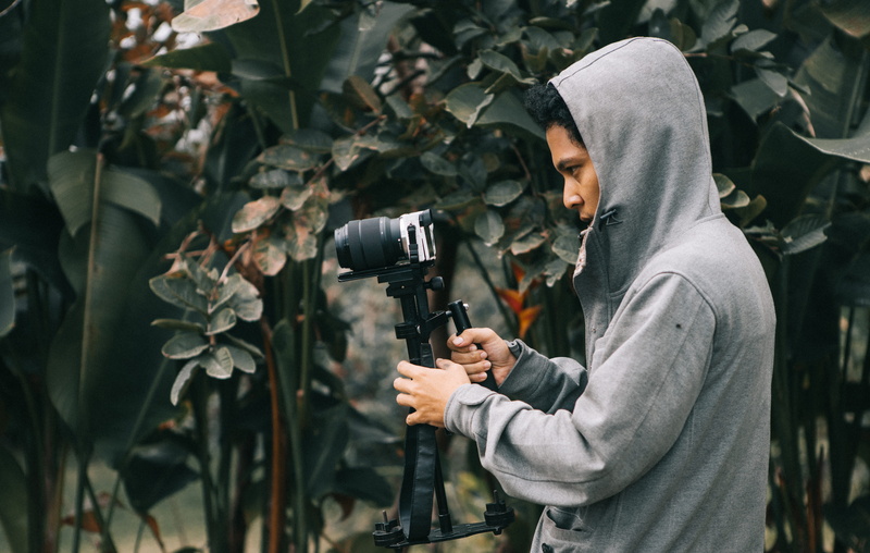 hoodie, photography themes, men, standing, hood, aiming, protection, photography, 5K, young men, one person, gun, occupation, camera, stablizer, adult
