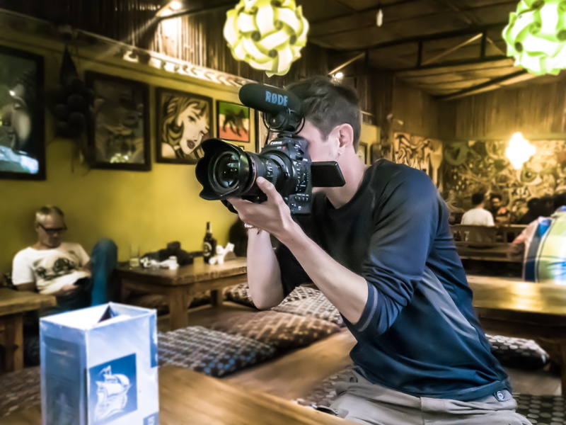 the electric pagoda, photographing, illuminated, video, photographic equipment, photographer, real people, one person, shoot, 4K, videographer, standing