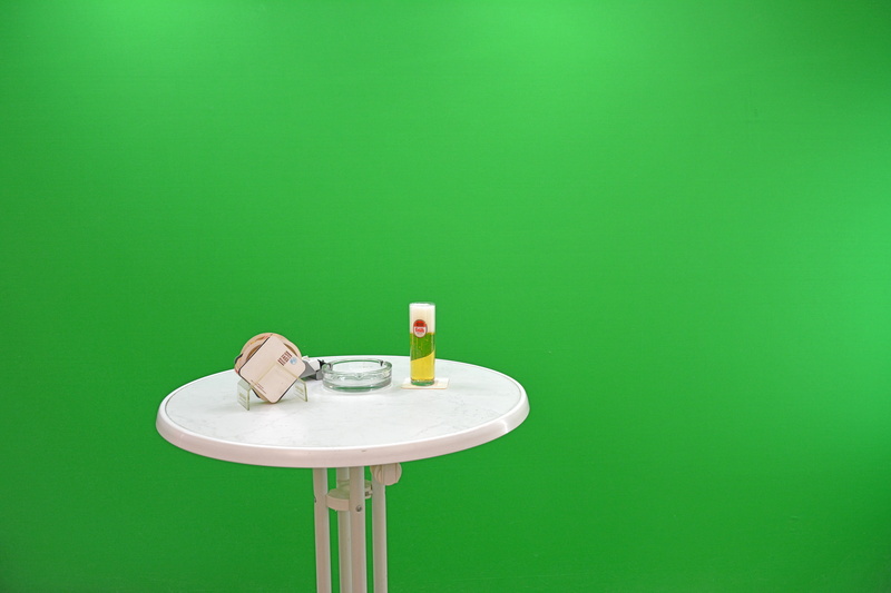 indoors, colored background, plate, greenbox footage, table, pub table, candle, copy space, isolated, wall - building feature, white color, green color