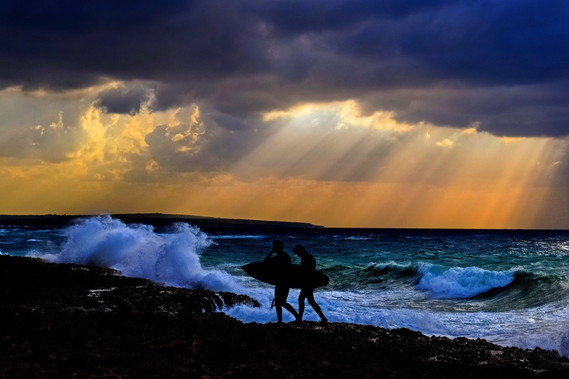 people, water sports, beach, water, white, sunset, two, surfer, motion, silhouette, leisure, sea, surf sports, yellow, sky, beauty in nature, power in nature