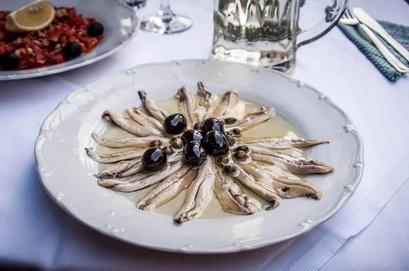 still life, portion, garnish, close-up, plate, dish, no people, fruit, salt anchovy, freshness, ready-to-eat, food, eat, starter, serving, indoors, national dish