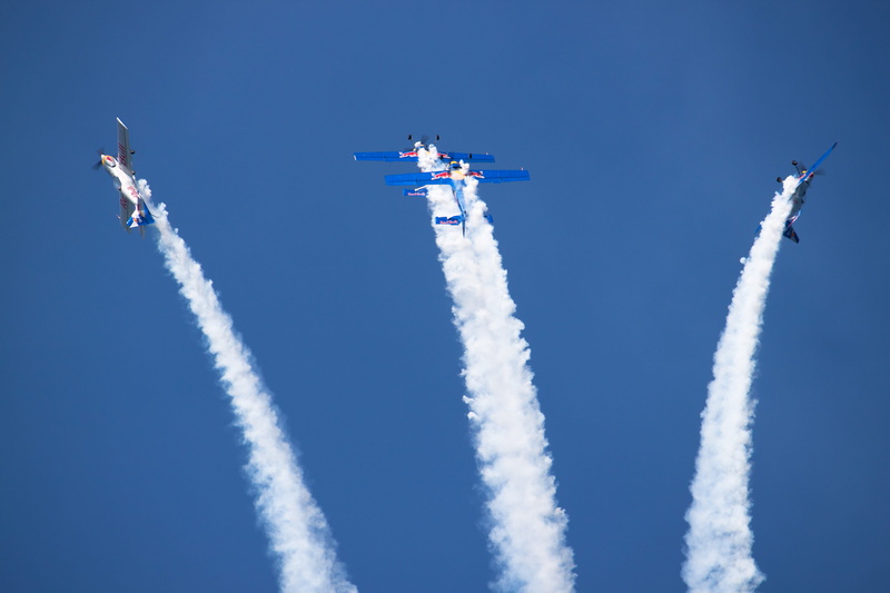 sky, on the move, air force, extra 300, low angle view, stunt flying, motion, blue, outdoors, smoke - physical structure, airplane, nature, acrobatics