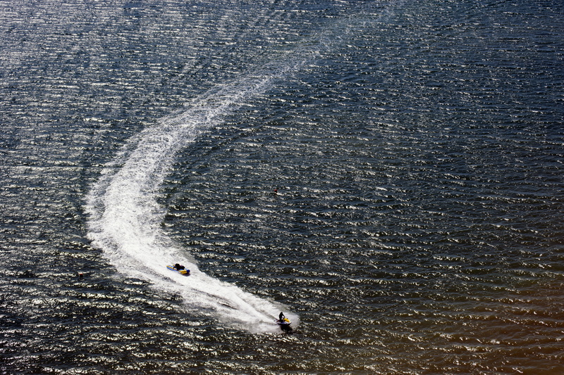motion, water, transportation, unrecognizable person, united states, nature, high angle view, long exposure, real people, panama city beach, one animal