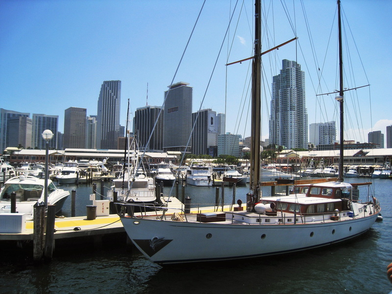 building, city, brown, office building exterior, cityscape, travel destinations, no people, built structure, travel, sea, bay, miami, sailing vessel, pole