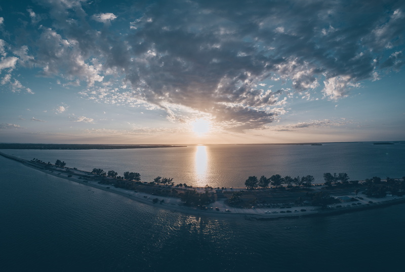 water, clouds, sea, sky, lens flare, idyllic, 8K, outdoors, tranquil scene, reflection, united states, sunlight, island, sanibel causeway, horizon, sanibel