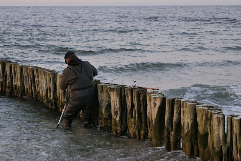 leisure activity, sea, angler, 5K, full length, one person, beauty in nature, motion, men, day, waters, coastal protection, angel, fisherman, baltic sea