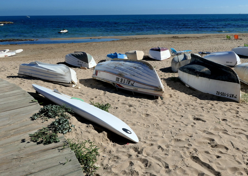 outdoors, sand, horizon over water, beauty in nature, horizon, boats, scenics - nature, coast, sunlight, day, no people, seaside, sky, mode of transportation
