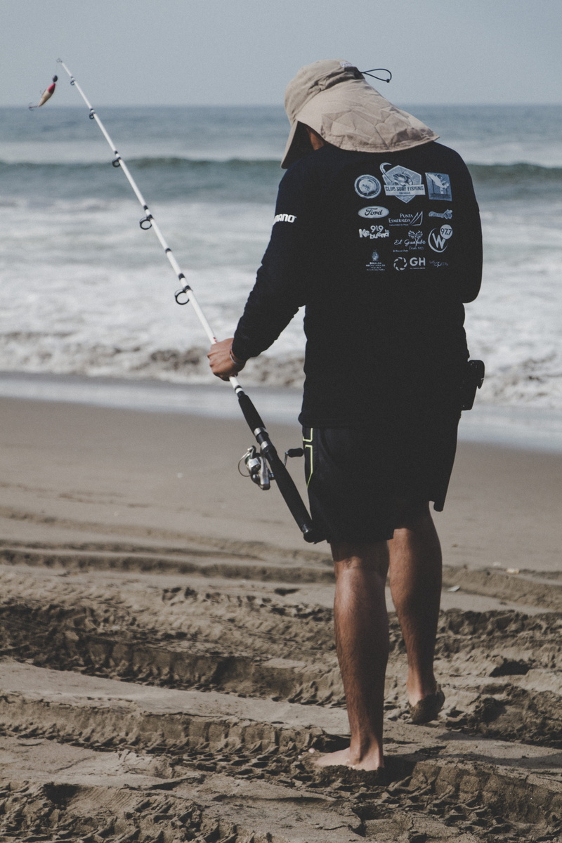 fishing tournament, one person, focus on foreground, land, day, men, bass master, recreation, lifestyles, top, water, seascape, action, fishing, fisher