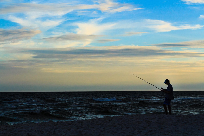 beach, one person, sea, shore, 1080P, standing, fishing, vacation, leisure activity, outdoors, surf, fishing rod, water, beauty in nature, outdoor, full length
