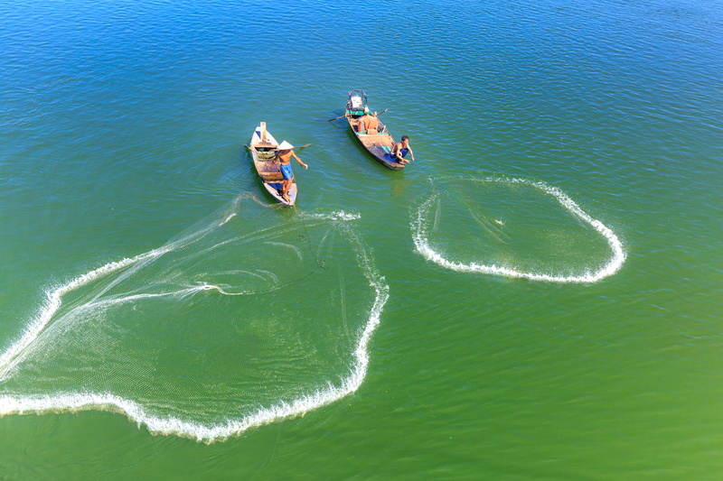 ocean, beach, surf, fishermen, wave pattern, fishing net, island, summer, daylight, boat, travel, riding, recreation, landscape, mode of transportation