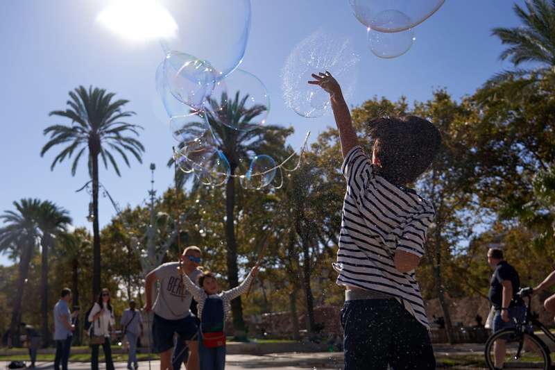 4K, palm trees, splash, childhood, real people, child, bubbles, day, arms raised, kids, boys, men, casual clothing, group of people, human arm, people