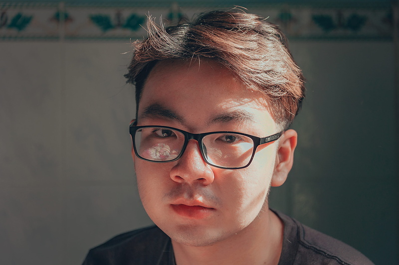 front view, contemplation, hair, wearing, indoors, looking at camera, human face, man, face, hairstyle, adult, depression - sadness, boy, person, eyes