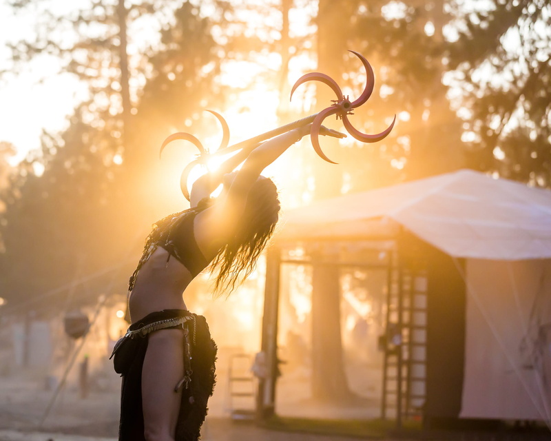 festival, tent, music festival, lifting, bar, sunrise, leisure activity, long hair, sky, art, real people, costume, tree, blade, flowart, architecture