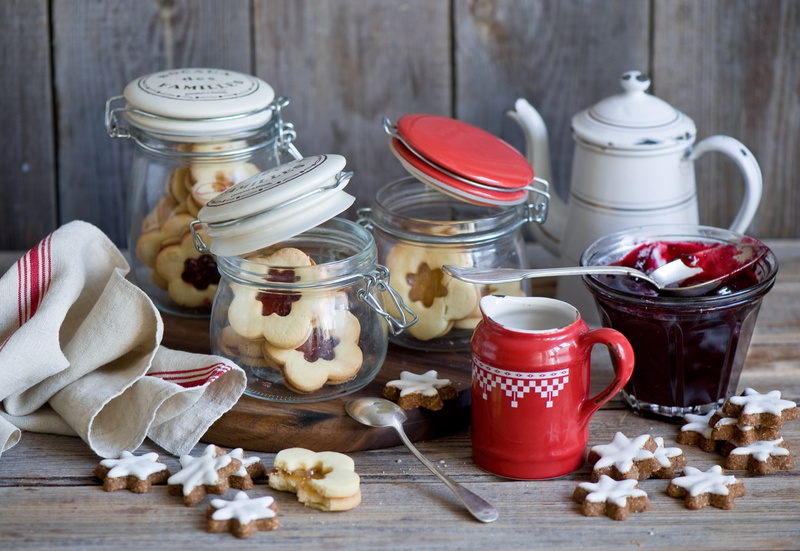 container, freshness, food and drink, sugar, red, preserves, table, still life, large group of objects, glass - material, wood - material, indoors, close-up