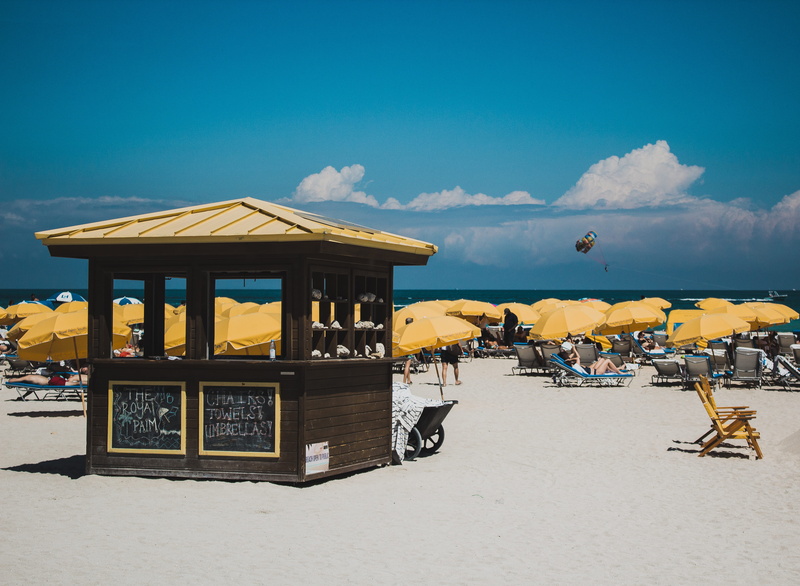 day, building exterior, sunny, summer, built structure, miami beach, blue, land, usa, water, south beach, parasol, kiosk, umbrellas, travel, weather, incidental people