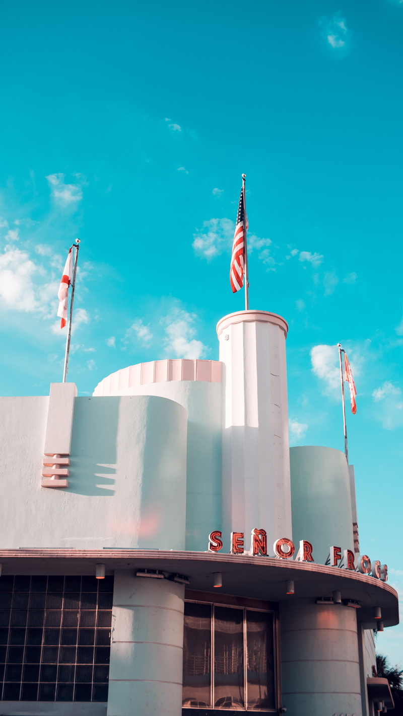 tower, miami, patriotism, sunlight, united states, low angle view, nature, 5K, outdoors, canon, flag, architecture, miami beach, day, communication, building exterior