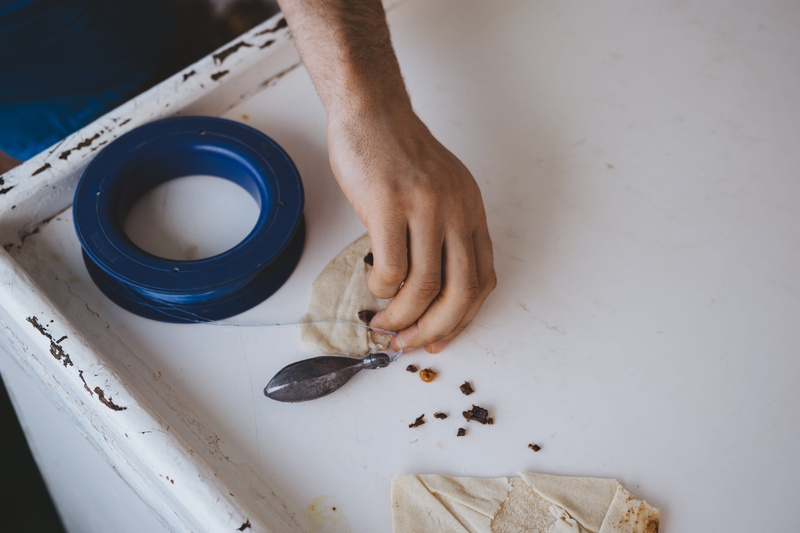 metal, prep, life, food and drink, product, human body part, preparing food, finger, lifestyle, one person, dessert, real people, water, wire, human limb