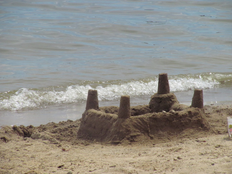 sport, wooden post, sandcastle, sunlight, land, nature, sandy, summer, scenics - nature, wake, day, outdoors, beauty in nature, ocean, palace, motion, no people
