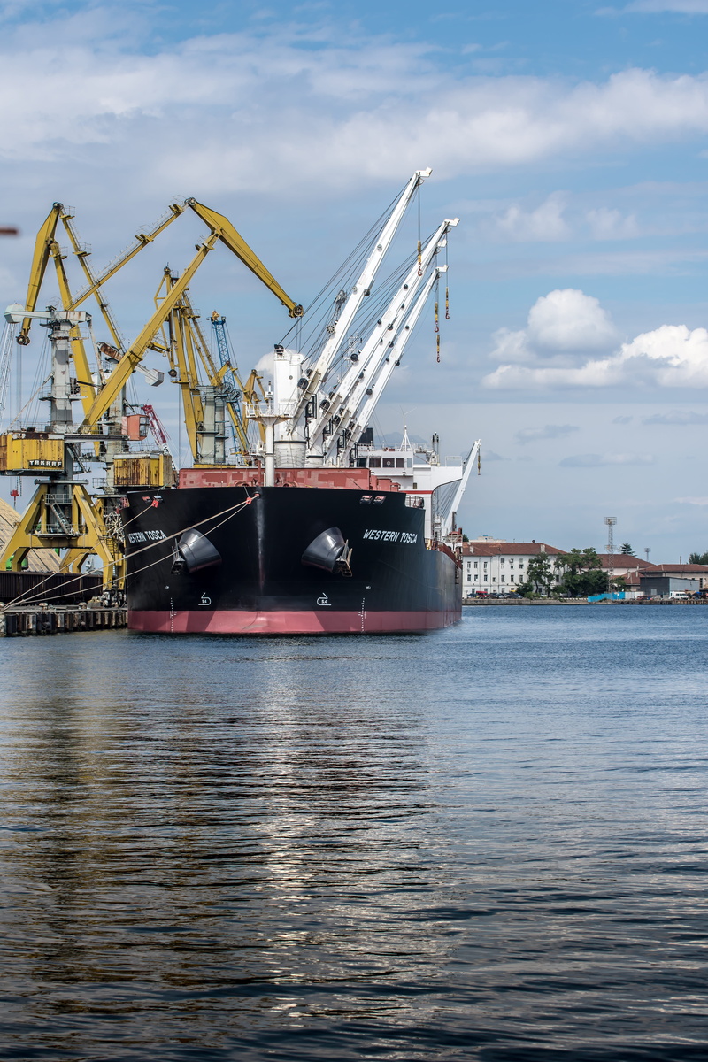 outdoors, seaport, chartering, construction equipment, cloud - sky, pier, freight transportation, sky, maritime, architecture, trade, shipping, nature