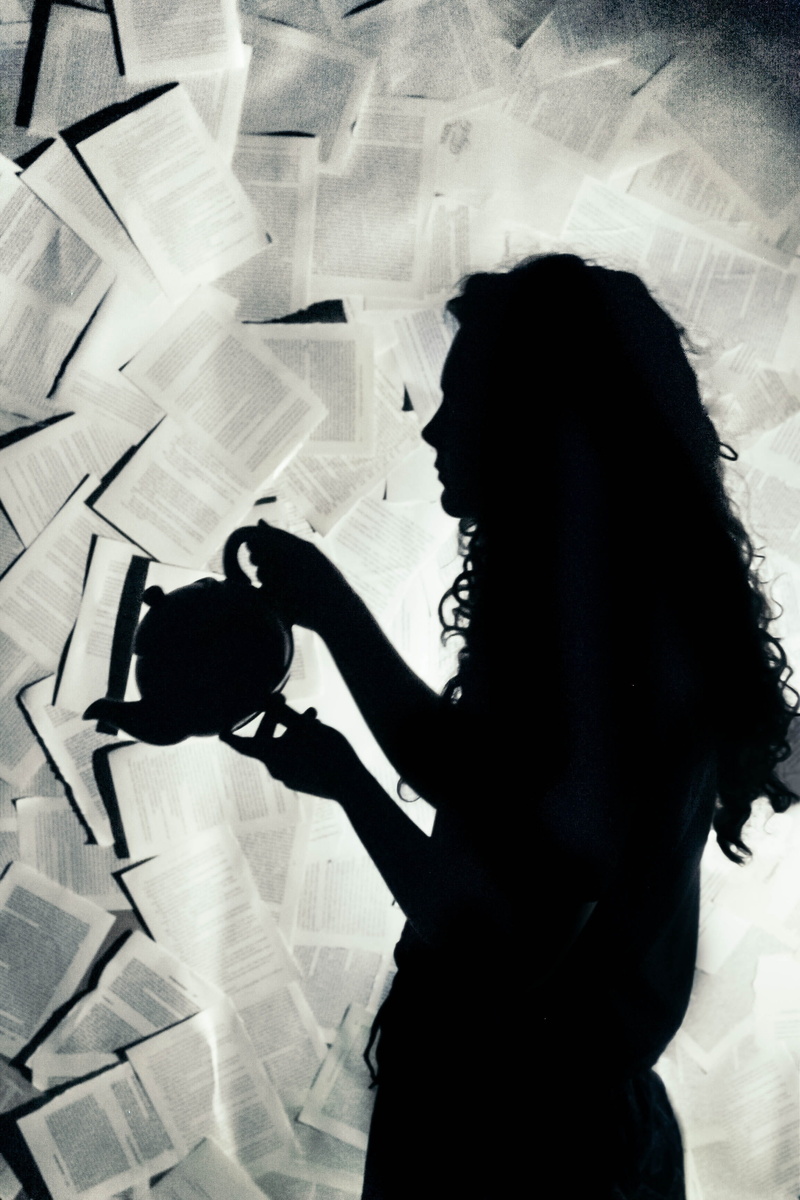 abstract, alice in wonderland, three quarter length, one person, black and white, indoors, teapot, united states, women, profile view, lifestyles, activity