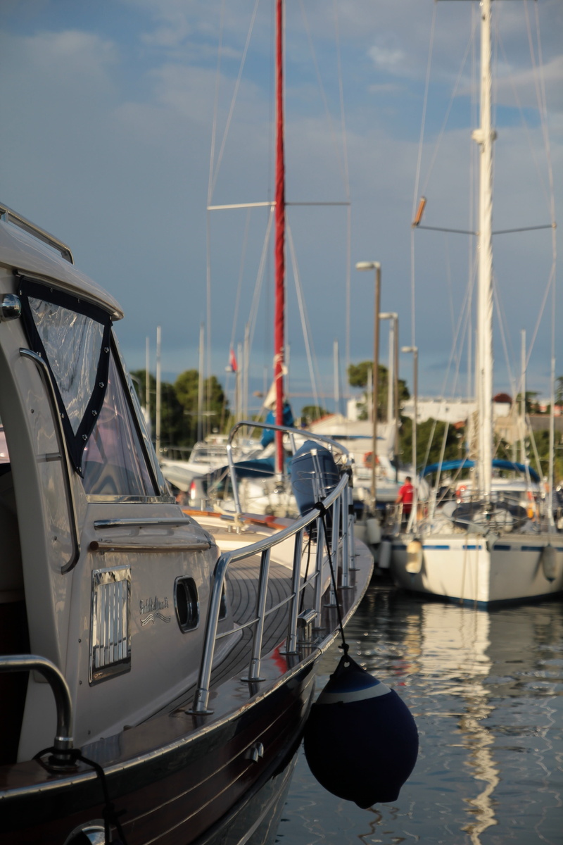 reflection, mode of transportation, tourism, leisure, marina, mast, yacht, yachting, outdoors, sea, cruise, nautical, vacation, moored, transportation