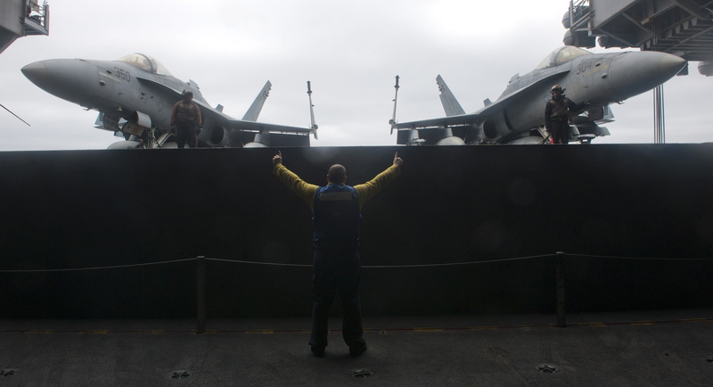 architecture, lifestyles, nature, jets, aircraft carrier, one person, transportation, protection, leisure activity, aircraft, arms raised, ship, cloud - sky