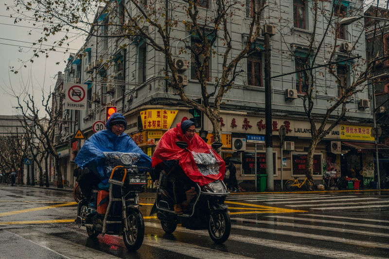 land vehicle, street, china, city street, ride, mode of transportation, lifestyles, men, moto, outdoors, built structure, riding, real people, on the move