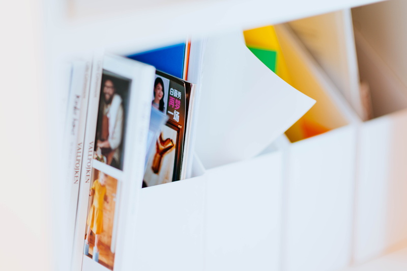 single object, close-up, black, no people, bookpage, selective focus, indoors, focus on foreground, copy space, appliance, 5K, domestic room, printed