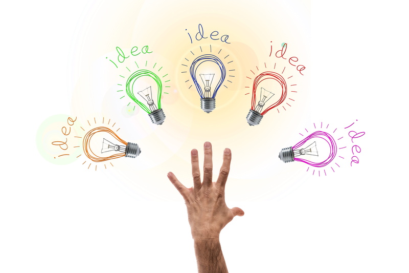 one person, studio shot, directly above, literature, high angle view, time, light bulb, human limb, potential, digital composite, move, university, knowledge