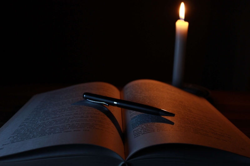 studio shot, publication, paper, studying, dark, selective focus, knowledge, light, learn, education, still life, focus on foreground, learning, open, wood - material