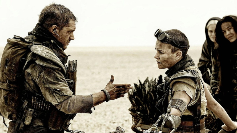 young adult, two people, beach, government, sea, clothing, men, sky, Charlize Theron, outdoors, people, water, land, Mad Max: Fury Road, togetherness, standing