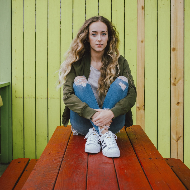 jeans, picture, portrait, looking at camera, hairstyle, long hair, front view, 2K, contemplation, full length, wood, day, women, lifestyles, model, doyle