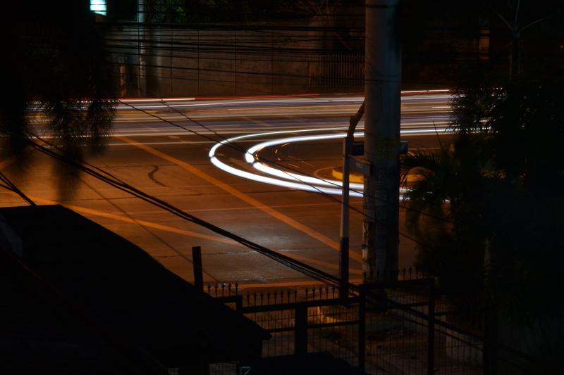 illuminated, blurred motion, motion, built structure, high angle view, architecture, street light, tree, road, mode of transportation, night, long exposure