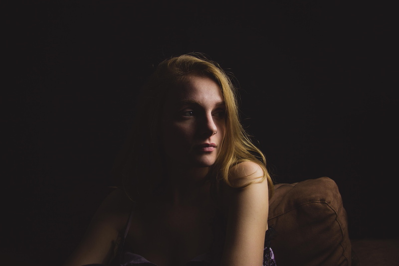 suede, beautiful woman, woman, s, hairstyle, headshot, sitting, copy space, emotion, portrait, contemplation, gray, portait, women, black background, adult