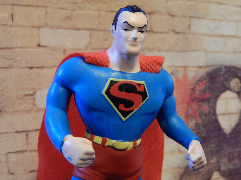 day, photo, strength, cartoon, action figure, rescue, mannequin, toy, scale, front view, city, character, human representation, architecture, caped, superhero
