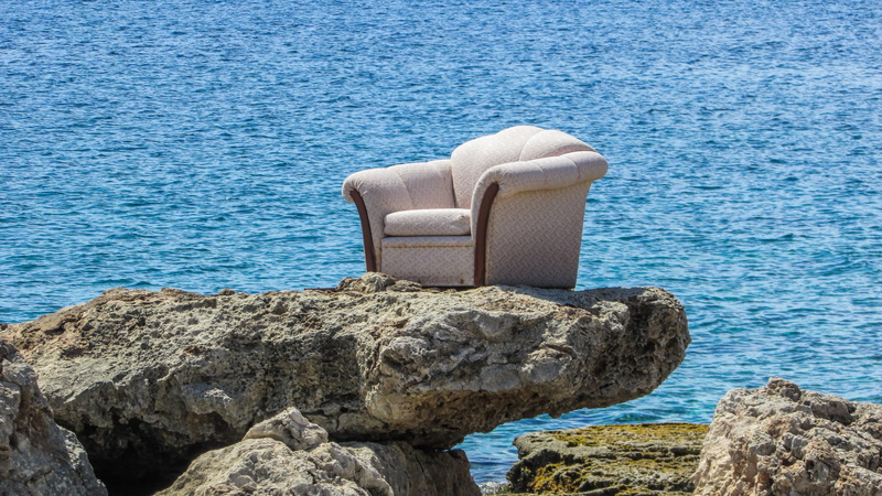 no people, near, sunlight, nature, water, seat, top, daytime, blue, summer, beach, tranquility, scenics - nature, sea, fabric, sofa, funny, rock, beauty in nature